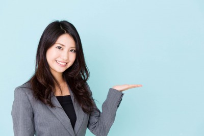 asian businesswoman on blue background